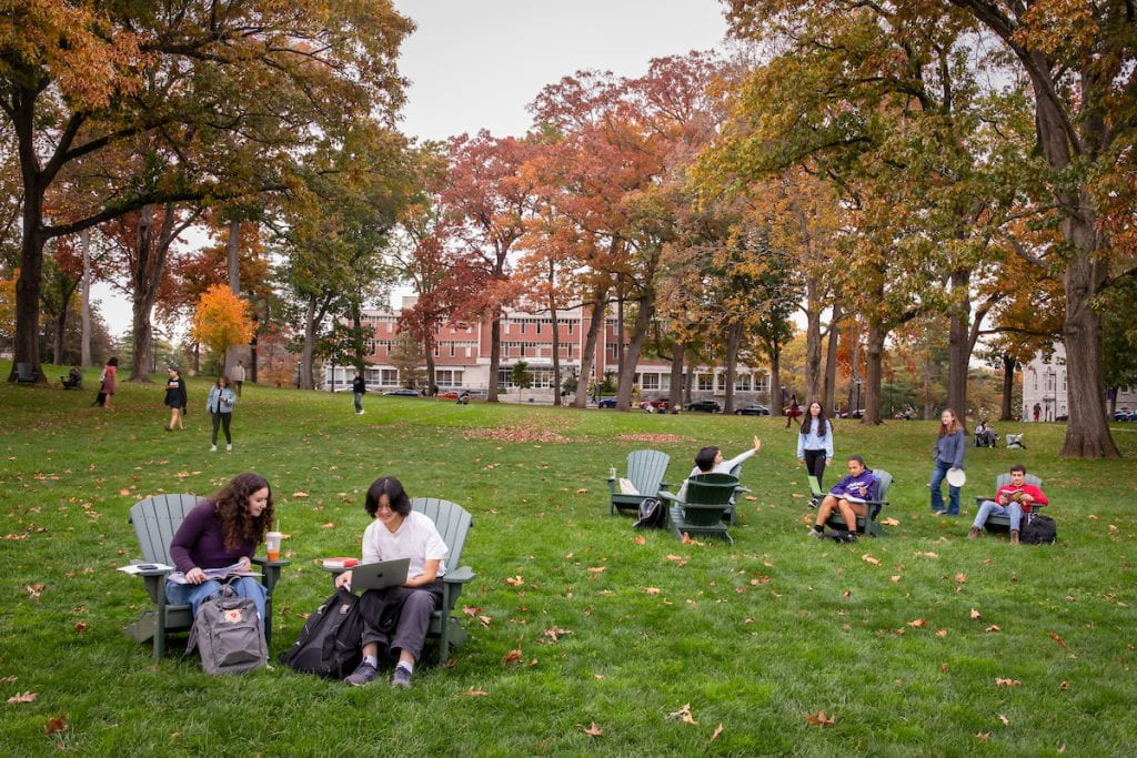 Students lounging in groups on the First-Year Quad